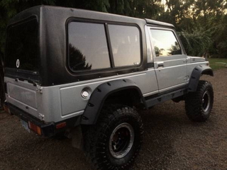 Illustration for article titled For $9,500, This 1985 Suzuki Samurai Goes Long
